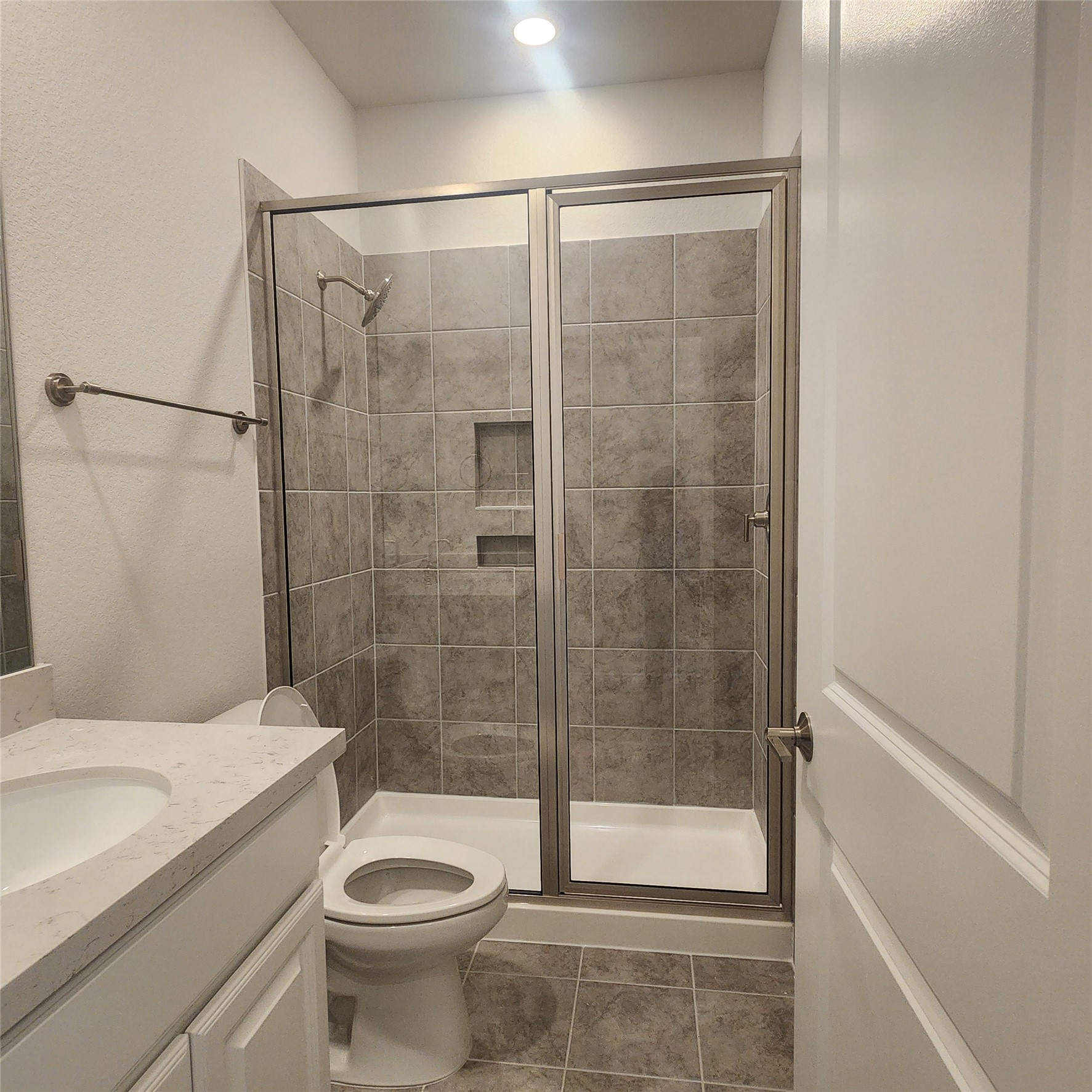 17507 Tulip Mdw Road Richmond, TX 77407 - Photo 30 of 47 a bathroom with a shower a toilet and a sink