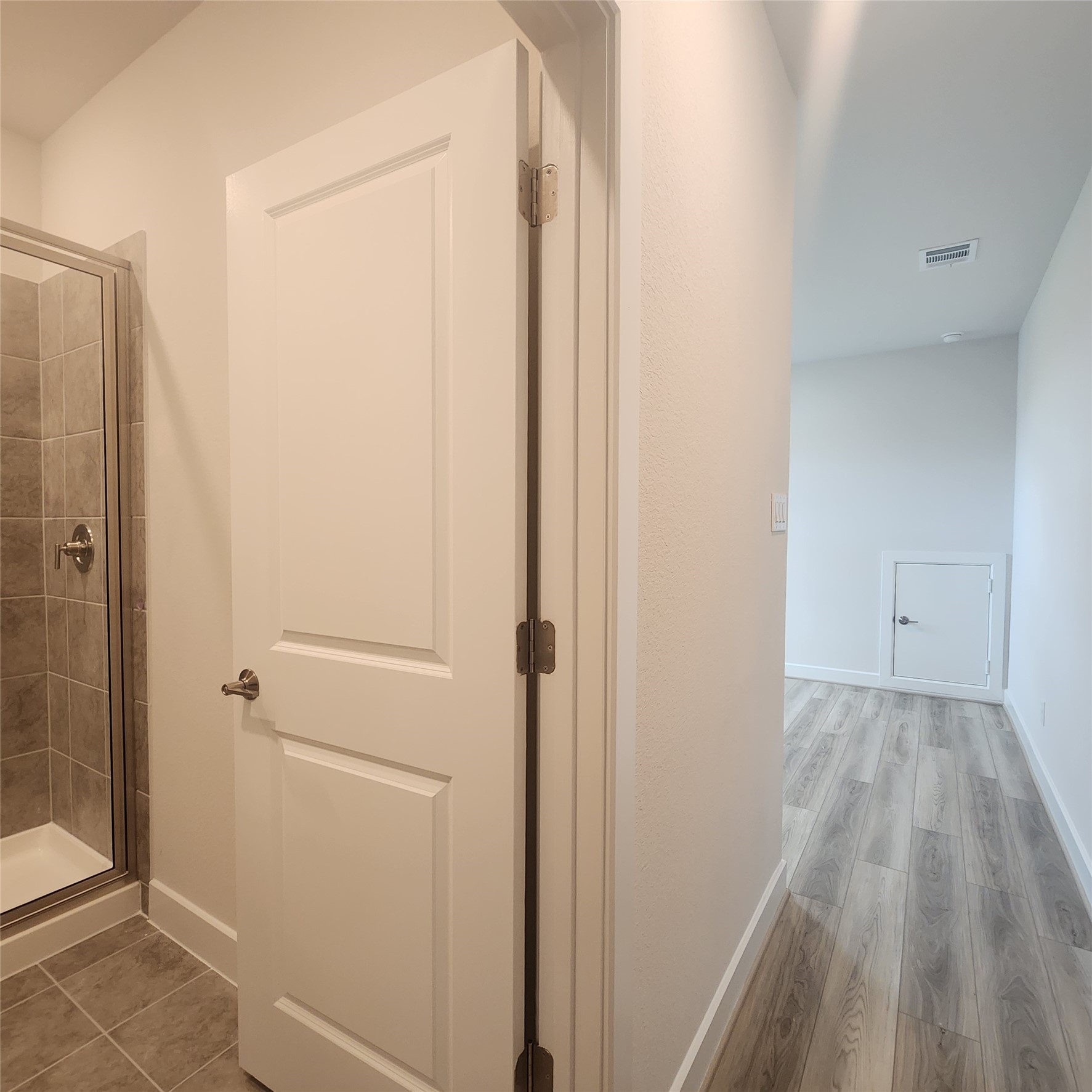 17507 Tulip Mdw Road Richmond, TX 77407 - Photo 32 of 47 a view of a hallway with wooden floor