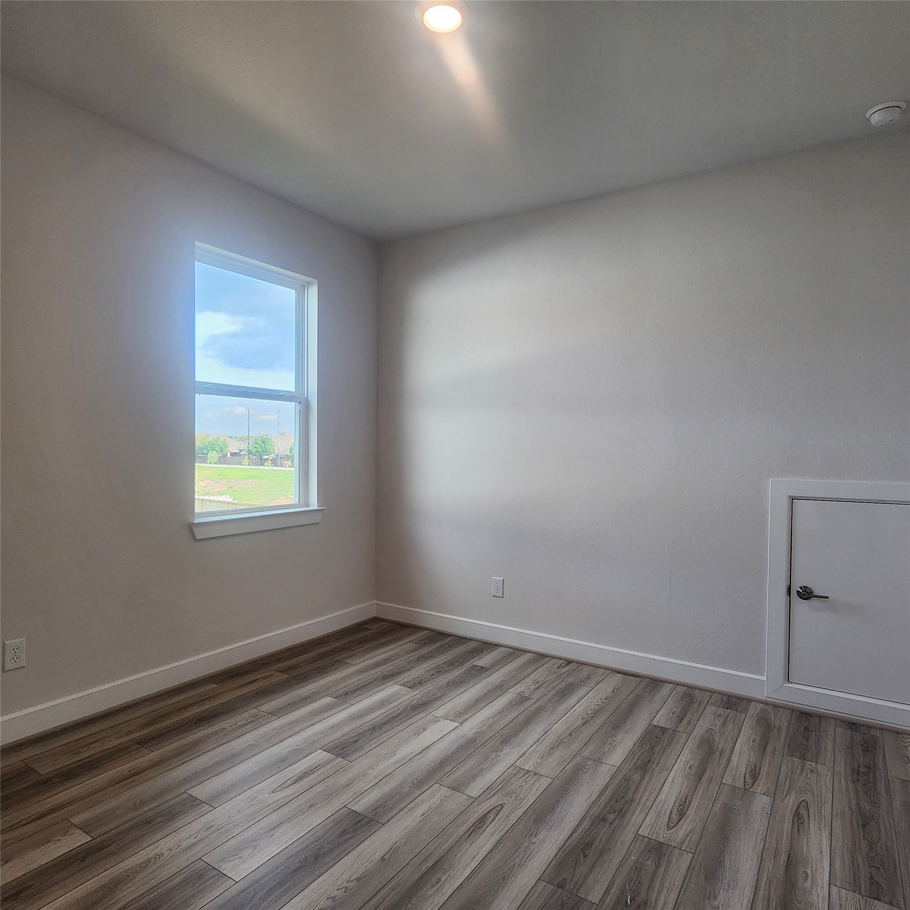 17507 Tulip Mdw Road Richmond, TX 77407 - Photo 33 of 47 a view of room with hardwood floor and window