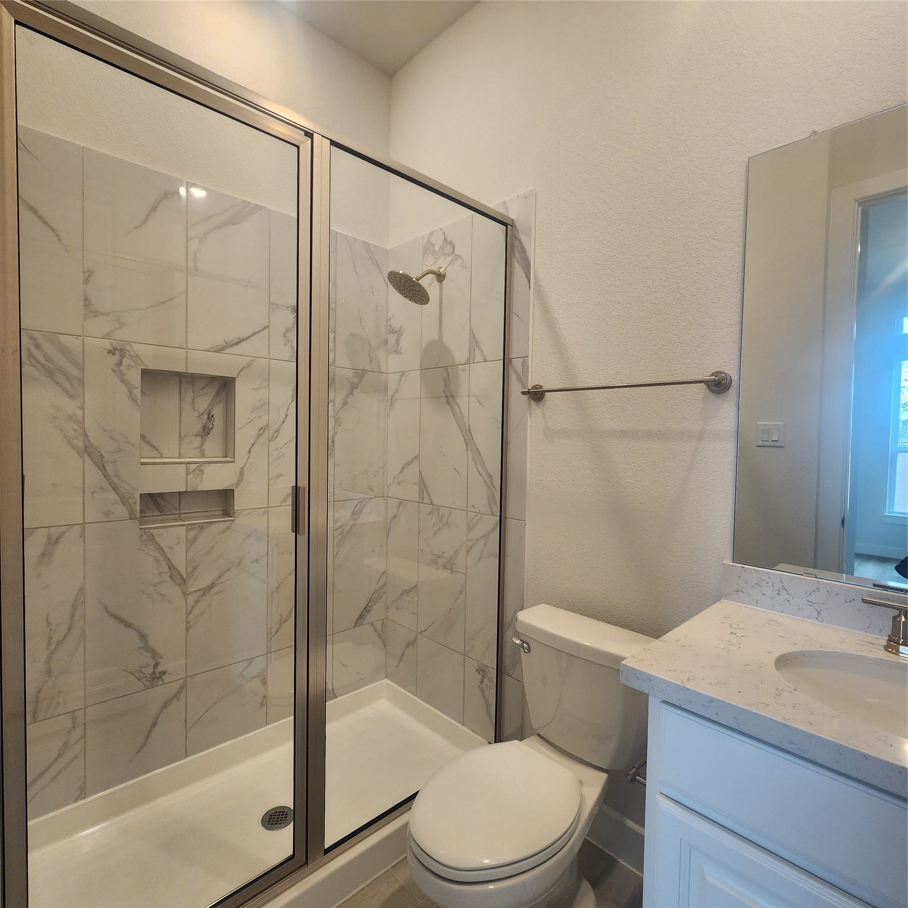 17507 Tulip Mdw Road Richmond, TX 77407 - Photo 35 of 47 a bathroom with a sink a toilet and shower