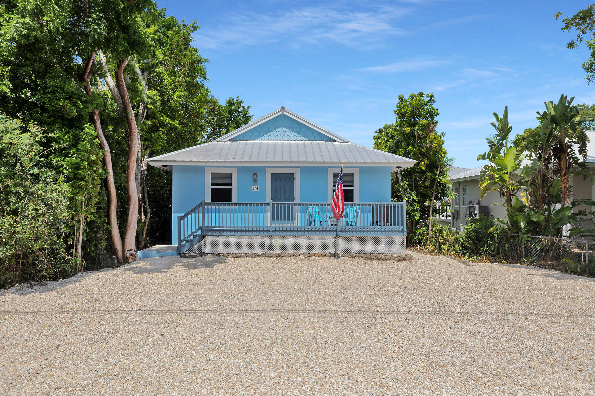 front view of a house with a small yard