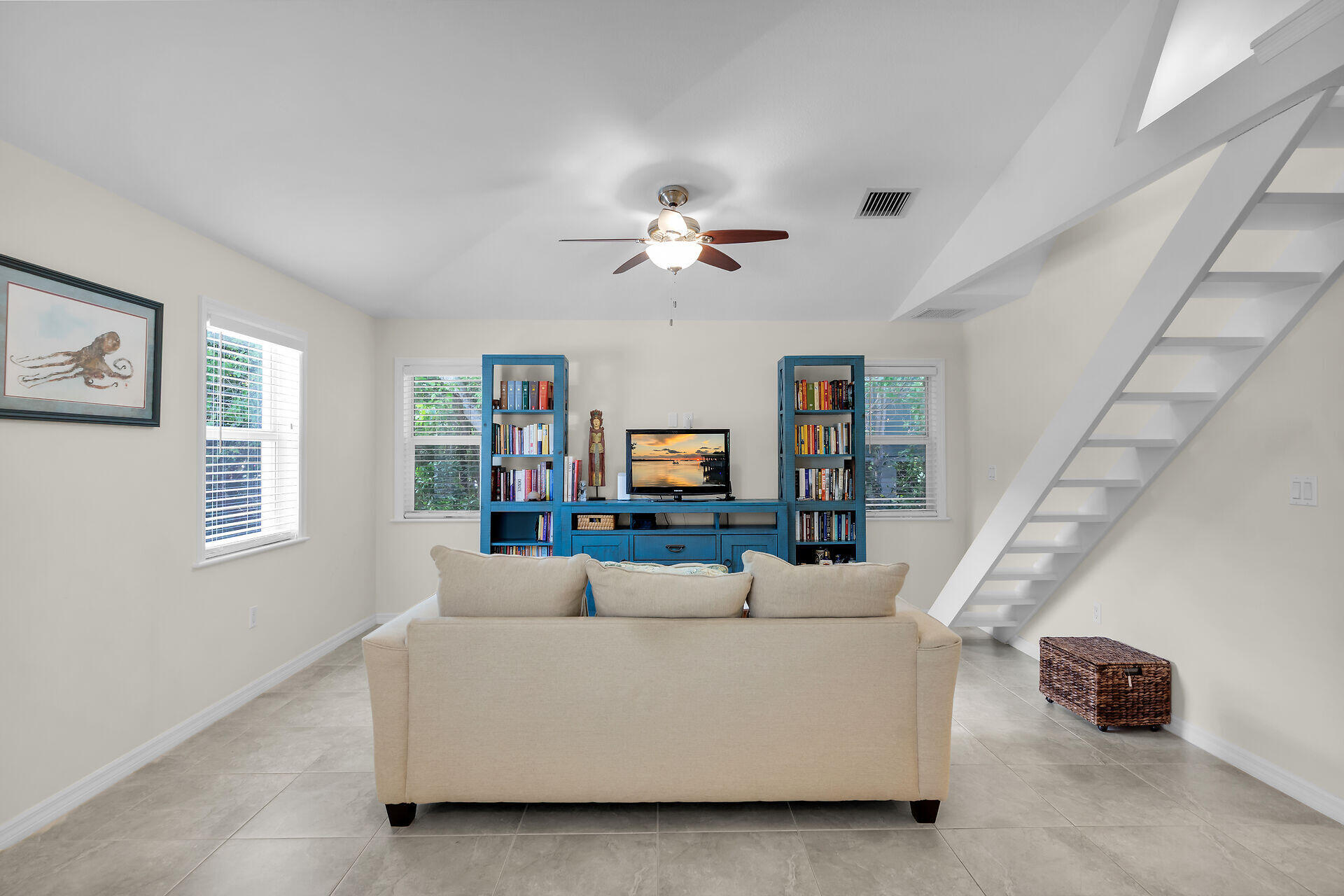 894 La Paloma Road Key Largo, FL 33037 - Photo 15 of 37 a living room with furniture and a window