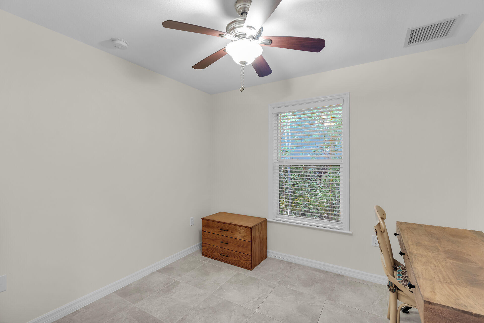 894 La Paloma Road Key Largo, FL 33037 - Photo 26 of 37 a view of an empty room with a window