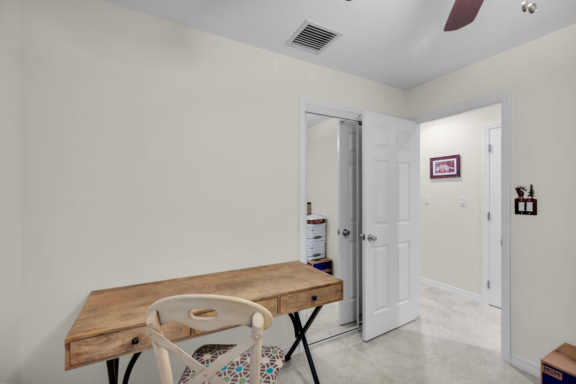 894 La Paloma Road Key Largo, FL 33037 - Photo 28 of 37 a room with a table and chairs