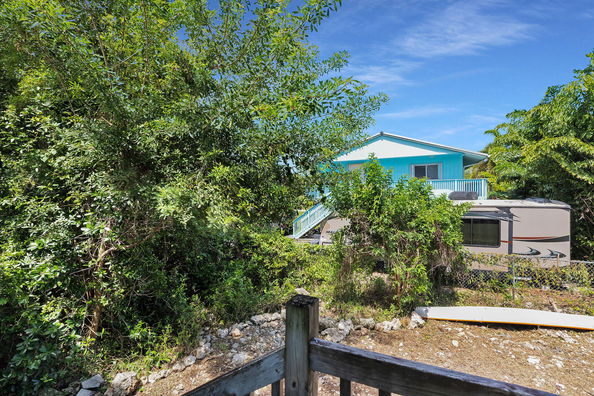 894 La Paloma Road Key Largo, FL 33037 - Photo 33 of 37 a view of a house with balcony