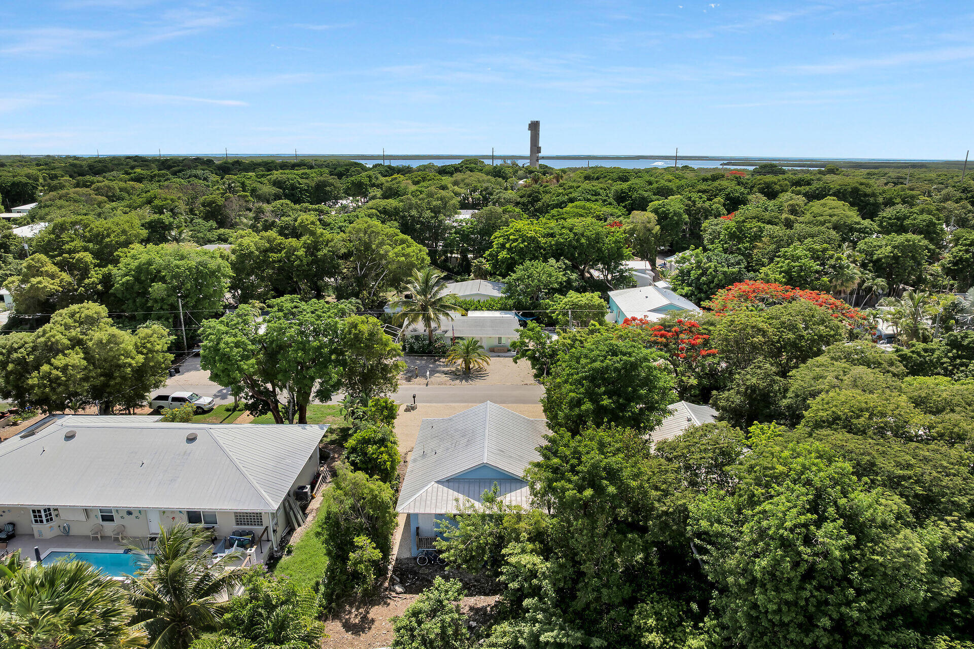 894 La Paloma Road Key Largo, FL 33037 - Photo 35 of 37 an aerial view of a house with a yard