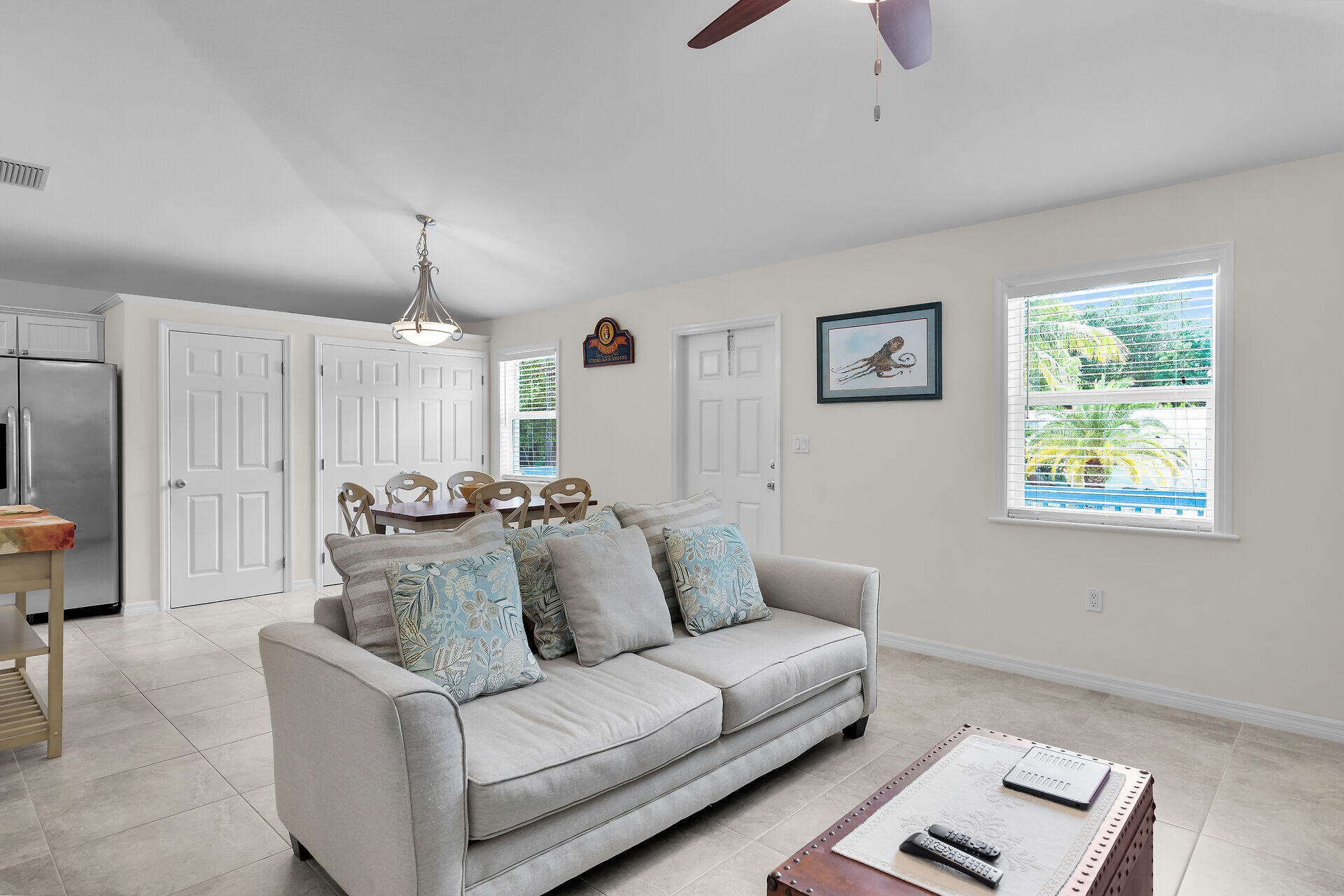 894 La Paloma Road Key Largo, FL 33037 - Photo 7 of 37 a living room with furniture and a window