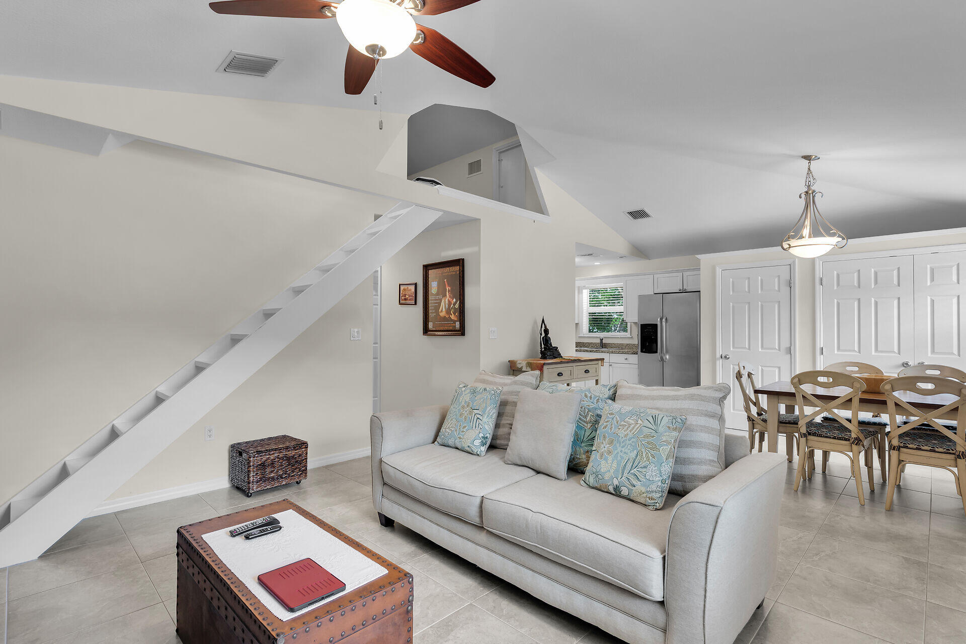 894 La Paloma Road Key Largo, FL 33037 - Photo 8 of 37 a living room with furniture and wooden floor