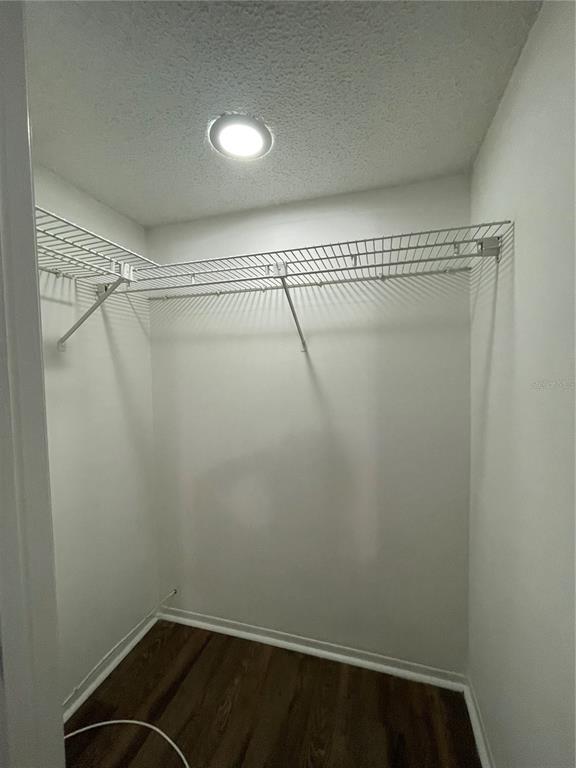 112 Palmetto Court, Unit 112 Oldsmar, FL 34677 - Photo 22 of 46 a view of a room with racks on the wall