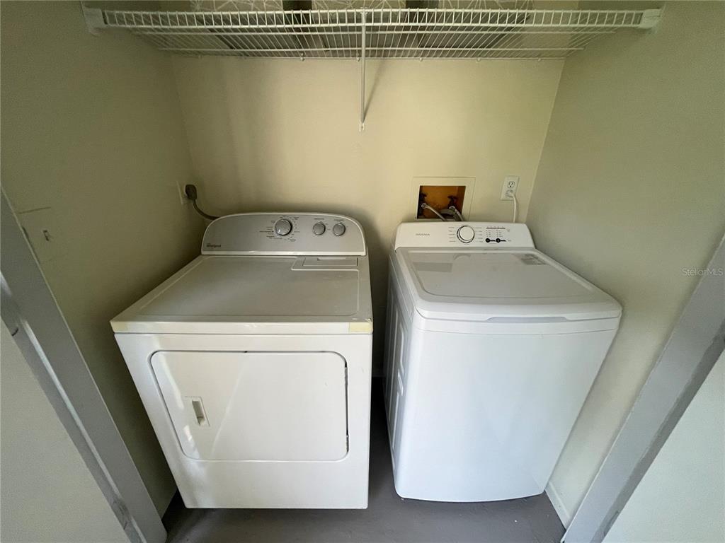 112 Palmetto Court, Unit 112 Oldsmar, FL 34677 - Photo 28 of 46 a utility room with dryer and washer