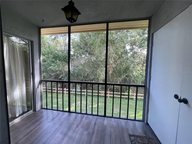 a view of balcony with deck