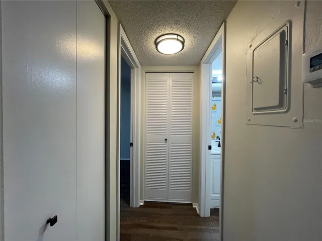 a view of a swimming pool with a lounge chairs