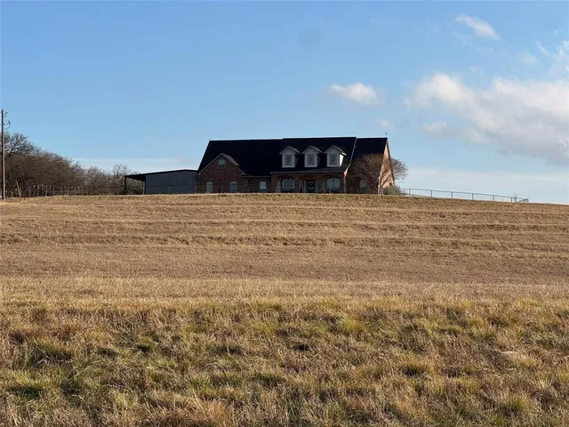 a view of ocean and mountain