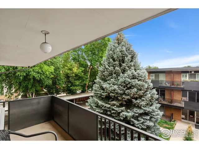 a picture of a big room with wooden floor