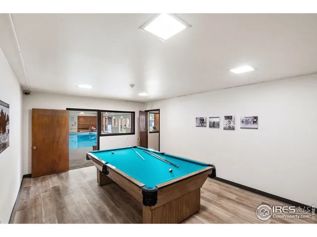 a view of a bedroom from a hallway