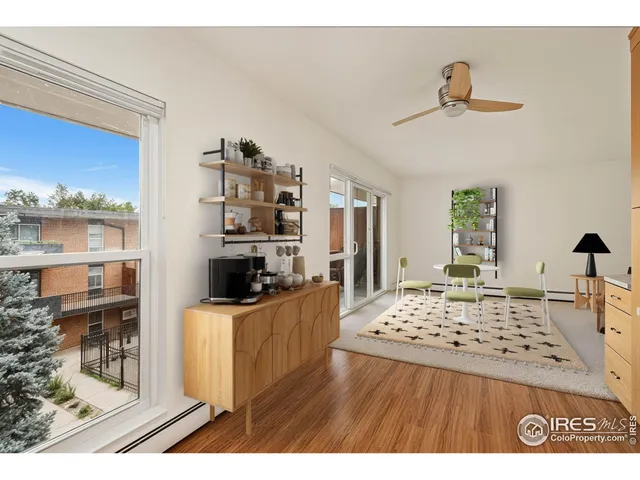 a bedroom with a bed and a mirror