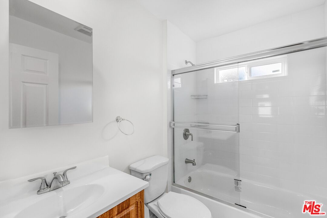 3509 Kinney Street Los Angeles, CA 90065 - Photo 9 of 12 a bathroom with a granite countertop sink toilet and shower