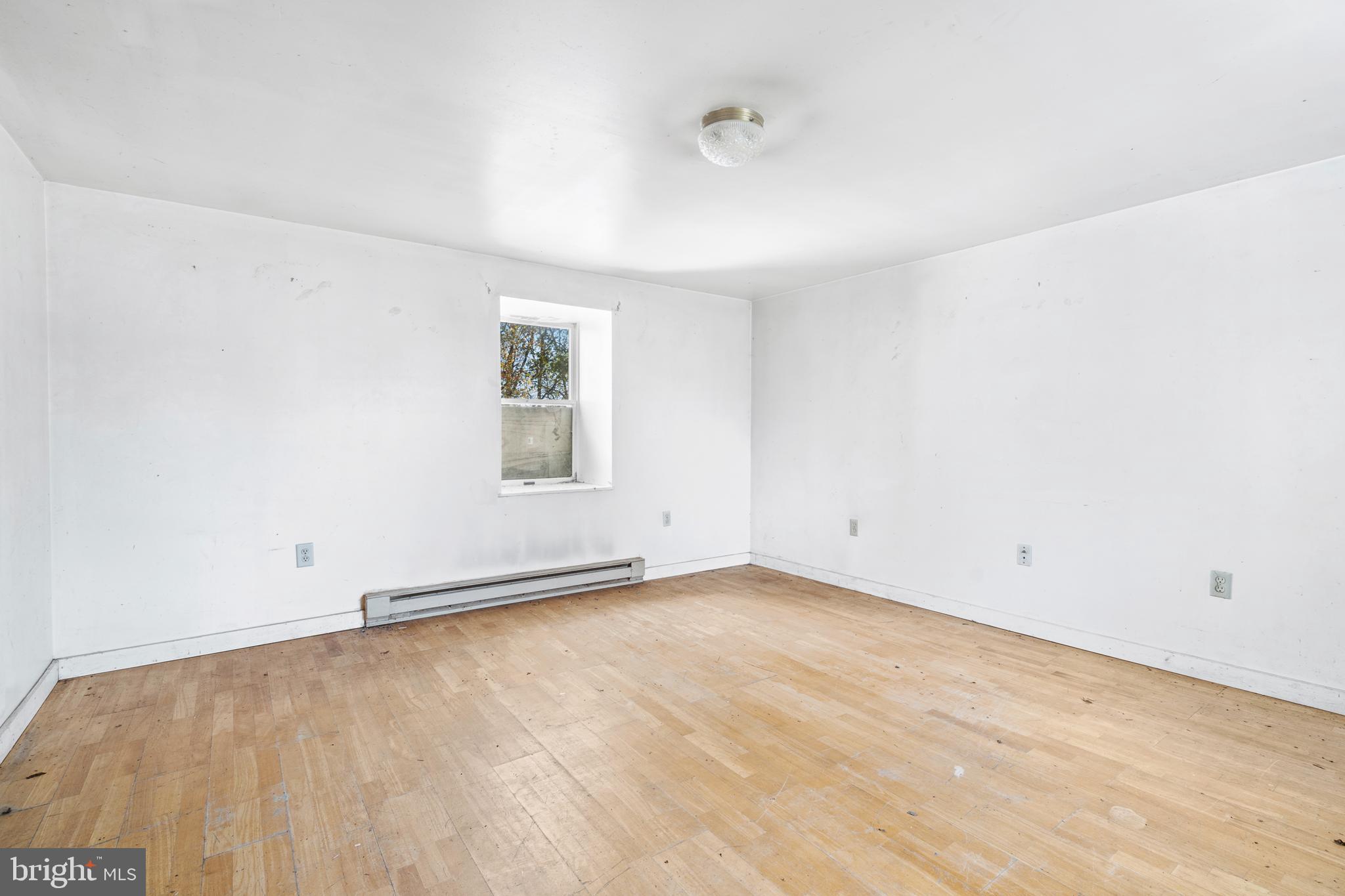 2481 Summit Point Road Summit Point, WV 25446 - Photo 24 of 35 wooden floor in a room