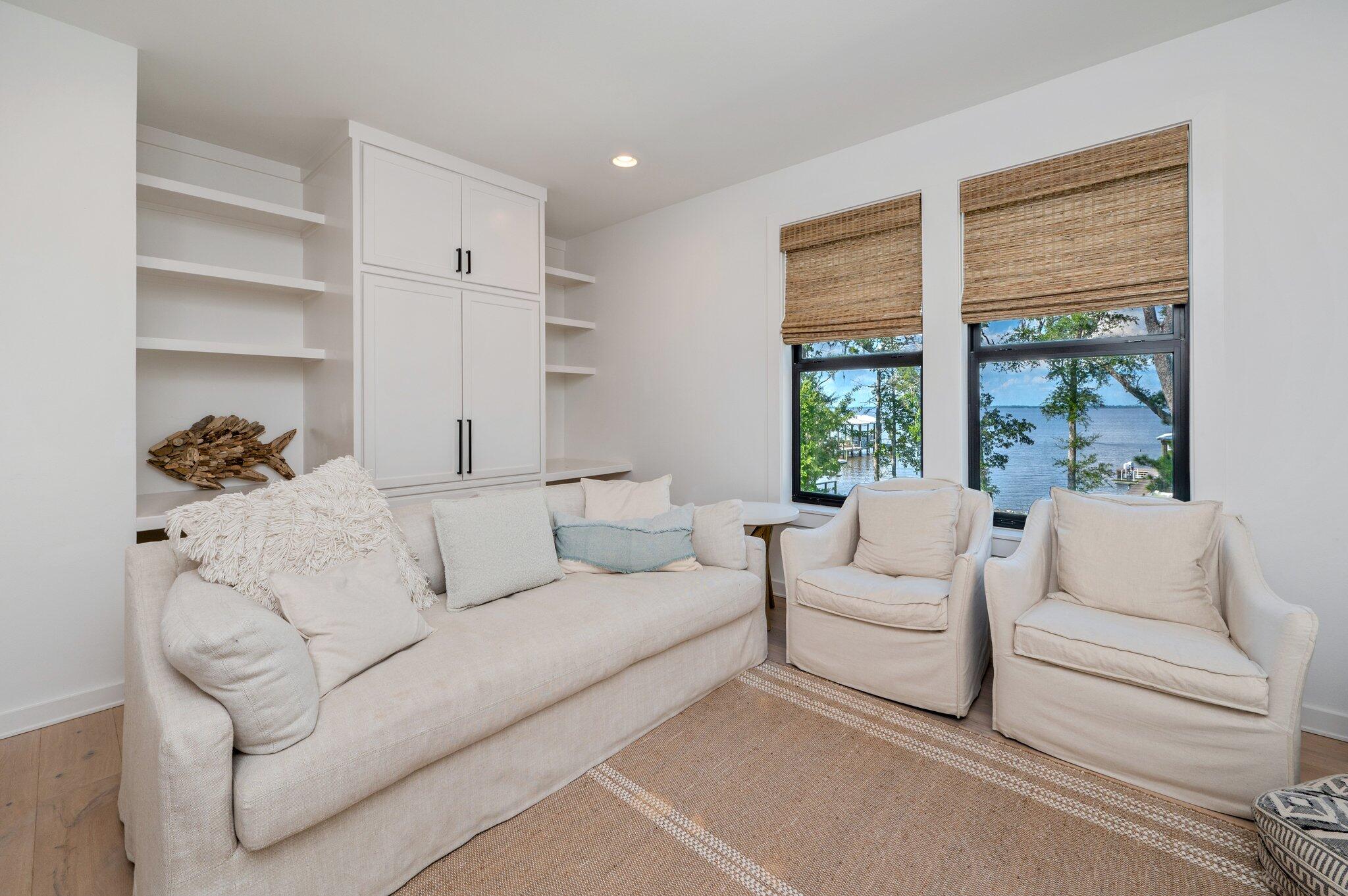 164 Bay Trace Santa Rosa Beach, FL 32459 - Photo 60 of 90 a living room with furniture and windows