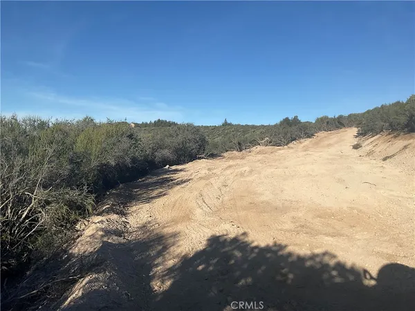 a view of mountain view with mountains in the background