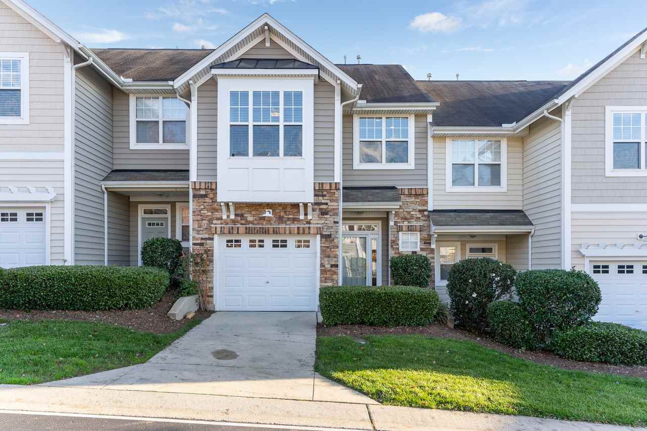 4925 Amber Clay Lane Raleigh, NC 27612 - Photo 11 of 11 Bright and open floor plan adorns this Glenwood North townhome with GARAGE. Kitchen has GRANITE counters and TILE backsplash. Gleaming BAMBOO HARDWOODS throughout main level. Lots of upgrades, crown molding, 9' ceilings and more. A MUST SEE! Exterior Front