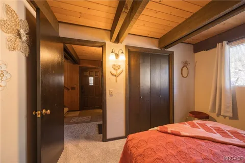a view of a hallway with washer and dryer