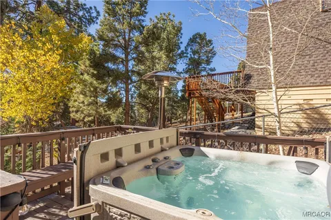 a view of a balcony with two chairs