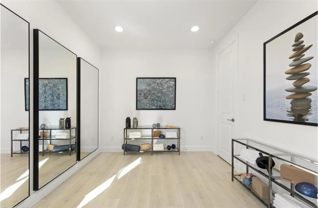 2504 Sturgis Street Forney, TX 75126 - Photo 21 of 24 a living room with furniture and a flat screen tv