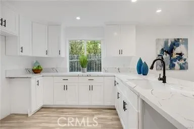 a bathroom with a toilet sink and shower