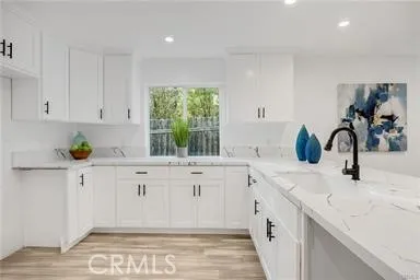 a bedroom with double bed and a window