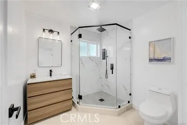 a living room with fireplace furniture and a rug