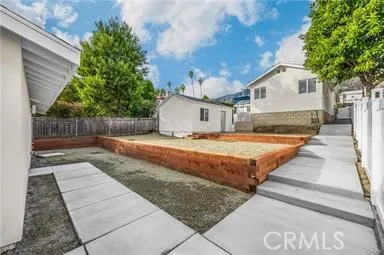 a house with view of trees in the background