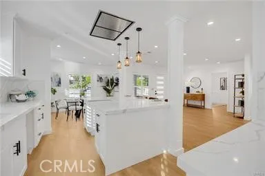 a view of a kitchen and dining room