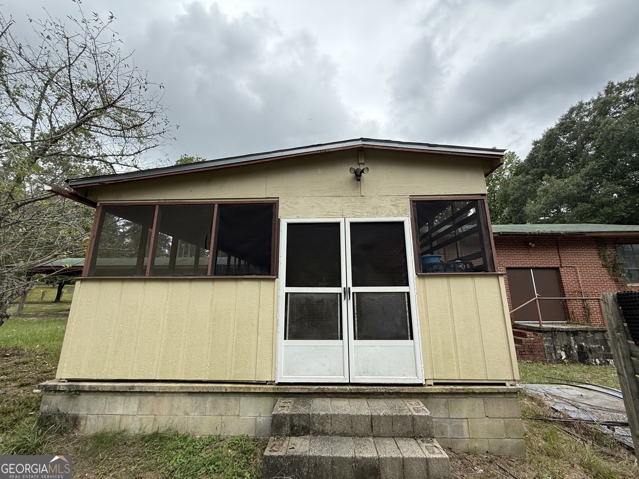 2251 Boy Scout Road Byron, GA 31008 - Photo 16 of 46 a front view of a house with a yard