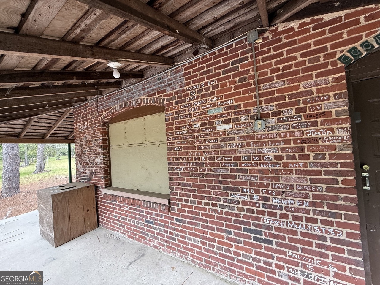 2251 Boy Scout Road Byron, GA 31008 - Photo 19 of 46 a view of a brick wall and an window