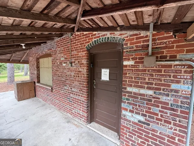 a house with trees in the background
