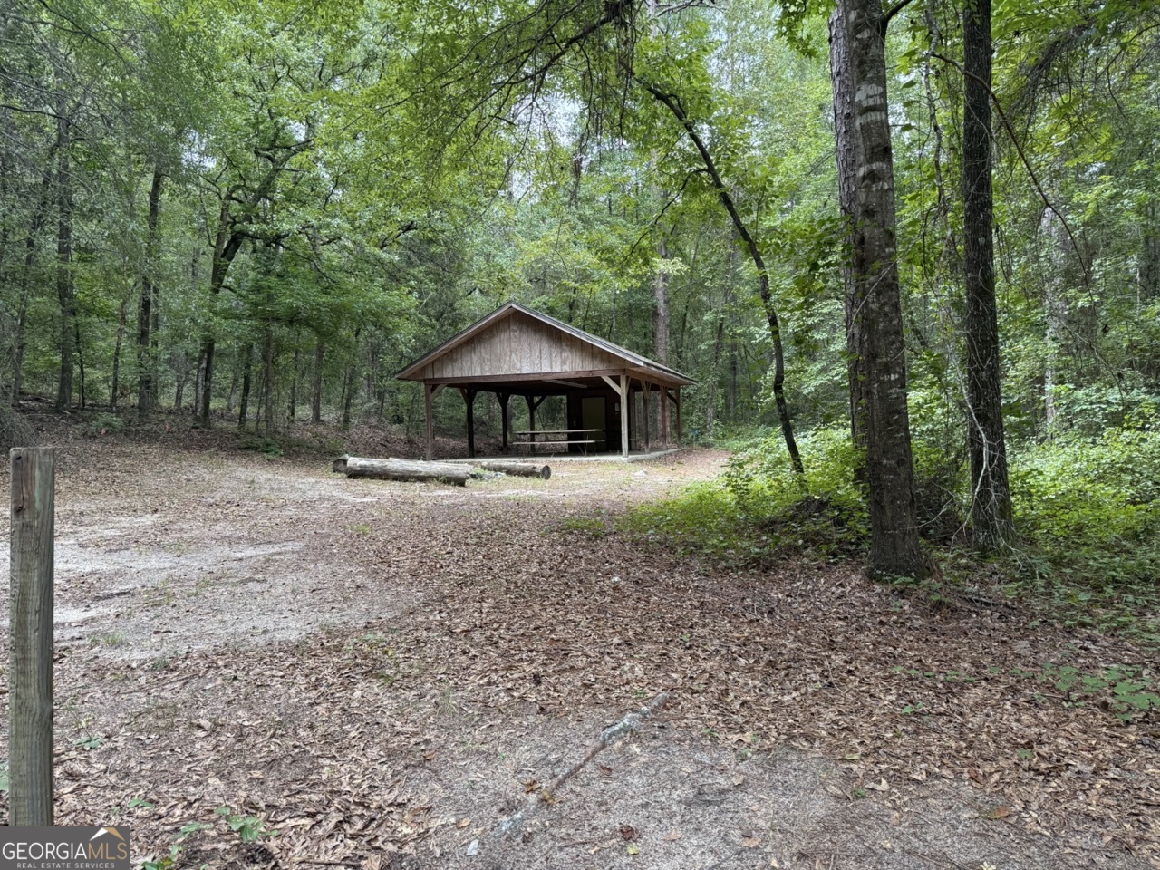 2251 Boy Scout Road Byron, GA 31008 - Photo 22 of 46 a house with trees in the background