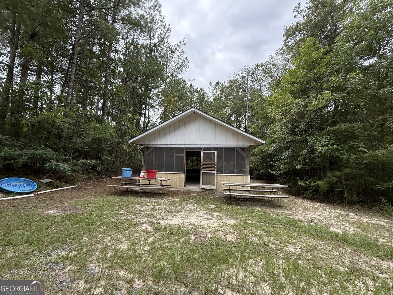 2251 Boy Scout Road Byron, GA 31008 - Photo 37 of 46 a view of a house with a yard and sitting area
