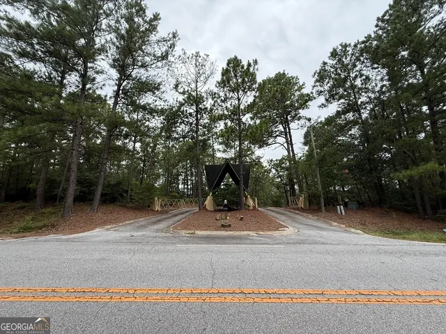 a aerial view of a house with a yard