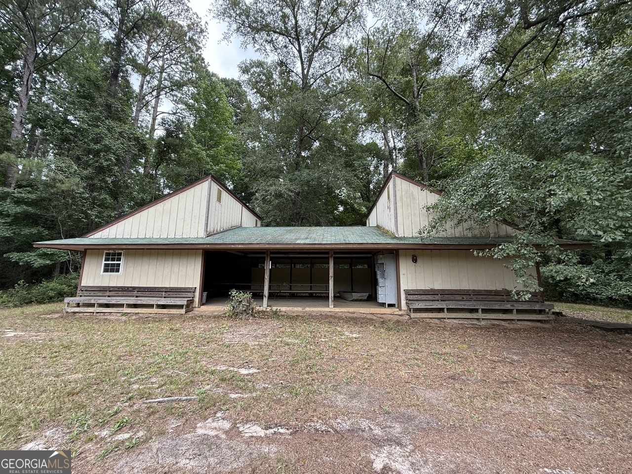 2251 Boy Scout Road Byron, GA 31008 - Photo 9 of 46 a front view of house with yard and trees in the background