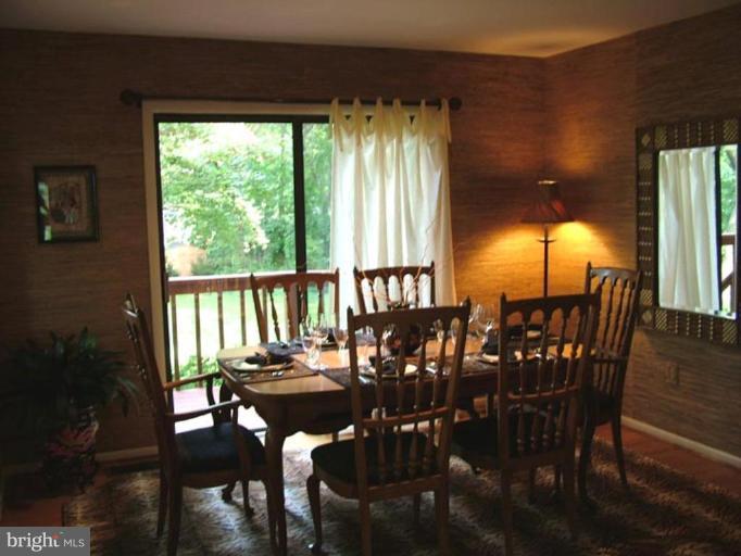 2211 South Arlington Ridge Road Arlington, VA 22202 - Photo 8 of 22 Dining room with deck, HW fls,