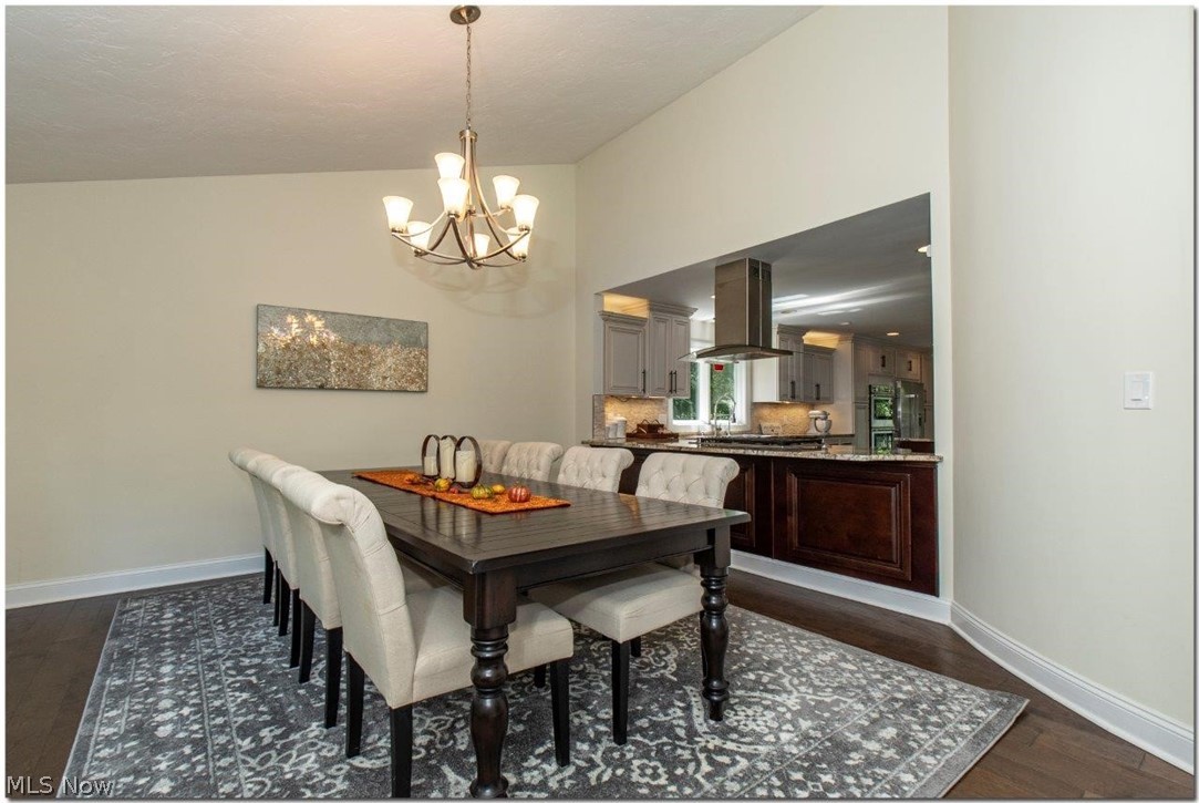 3200 Lander Road Pepper Pike, OH 44124 - Photo 8 of 35 Large formal dining room with vaulted ceiling and pass-through with additional Breakfast Bar/Buffet