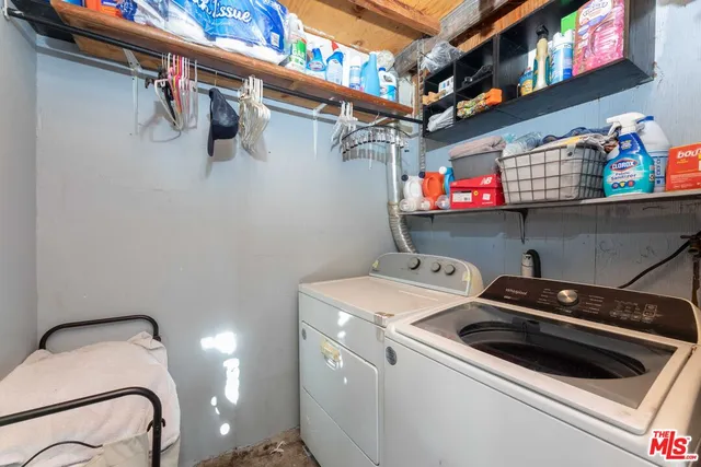 a view of outdoor space with seating area and trees around