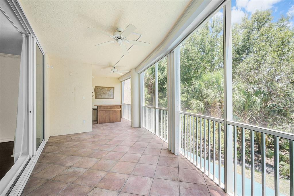 3603 North Point Road, Unit 202 Osprey, FL 34229 - Photo 16 of 50 a view of a hallway with an entryway