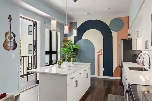 a outdoor space with lots of furniture and white walls