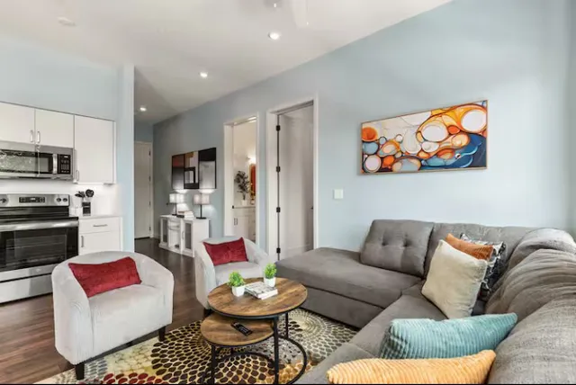 a living room with furniture and a couch