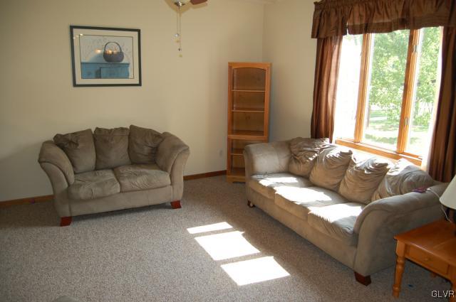 1261 Miller Road Wind Gap, PA 18091 - Photo 12 of 24 a living room with furniture and a large window