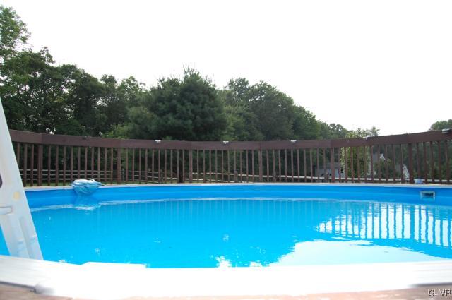1261 Miller Road Wind Gap, PA 18091 - Photo 19 of 24 a view of swimming pool with deck and yard