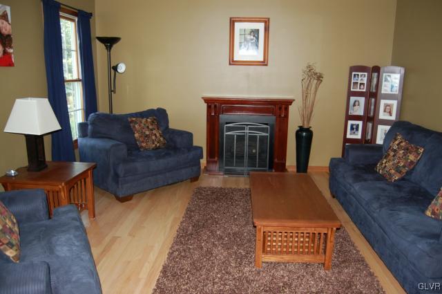1261 Miller Road Wind Gap, PA 18091 - Photo 2 of 24 a living room with furniture and a fireplace