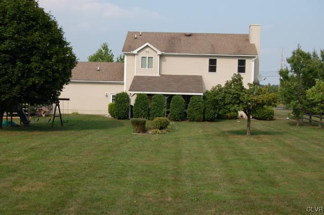 1261 Miller Road Wind Gap, PA 18091 - Photo 22 of 24 a front view of a house with garden